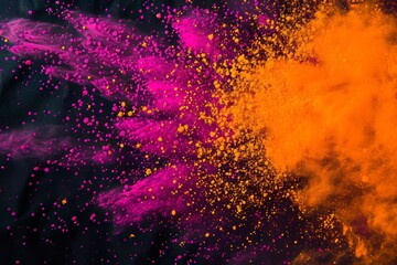 orange pink powder holi colors against black background