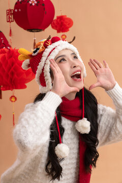 New Year's greetings to a happy Asian young woman