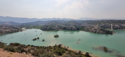 Landscape view of the lake in the mountains. View from above.