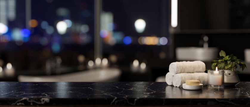 A space for displaying your product on a luxury black marble table in a luxurious bathroom at night.