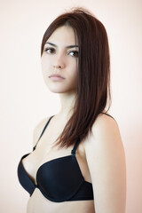 Fototapeta premium Beautiful brunette in black bra.