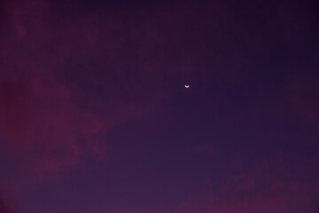 Beautiful lilac sky after sunset and moon