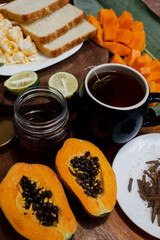 Breakfast table set with food.