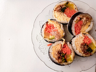 kimbap close-up. Korean style nori roll with yakiniku inside.