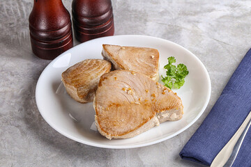 Roasted red tuna steak in the plate