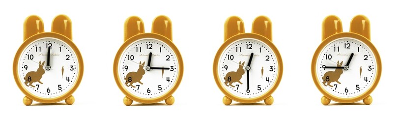 close up of a set of cute brown alarm clocks showing the time twelve; 12, 12.15, 12.30 and 12.45...