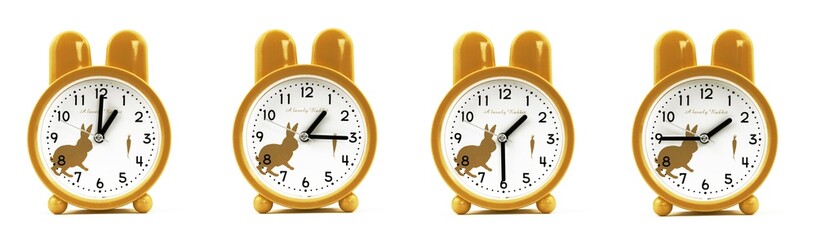 close up of a set of cute brown alarm clocks showing the time; 1, 1.15, 1.30 and 1.45 p.m dan a.m....