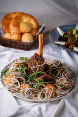 Kaurdak in Kazakh. lamb meat on a bone with potatoes, onions