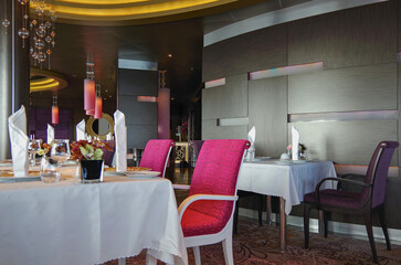 Elegant formal interior design with set tables style furniture, carpets and paneling onboard...