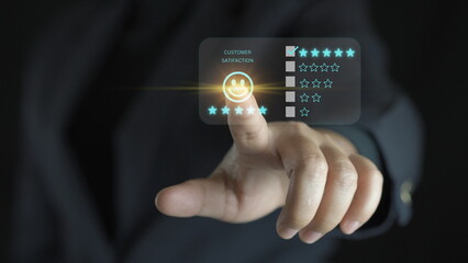 Businessman pressing smiley face emoticon on virtual touch screen. Customer service evaluation concept.