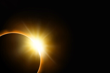 Total solar eclipse. Sunbeam on black sky