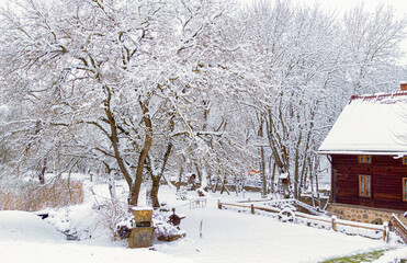 Farms and Farmhouses in the Snow. Windmill. AgWinter  Landscape.riculture and Rural Life at Winter Background.Rural 