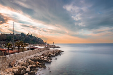 Naklejka premium Antalya Old Town marina entrance photographed at sunrise with long exposure technique