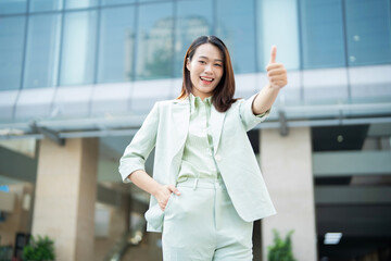 Portrait of young Asian businesswoman outside the office