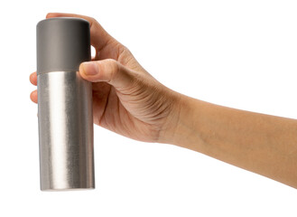 Female hand holding a spray can on white background, Silver perfume spray can or deodorizing spray isoalate on white with clipping path.