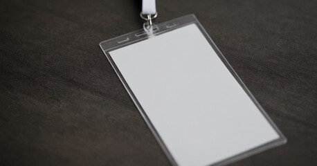 A blank ID card holder mockup against a white background, ideal for showcasing employee badges and corporate identification designs.