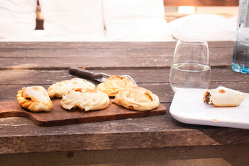 Empanadas on a wooden board