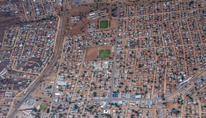 glider in flight over Rehoboth town, aerial from above,  Namibia