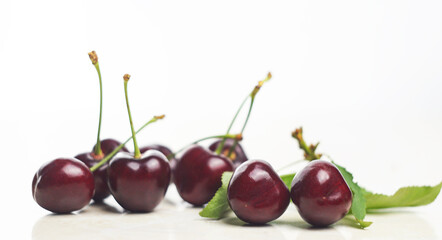 Red cherry on white marble
