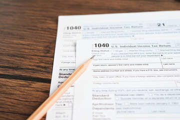 Obraz premium Tax form 1040 U.S. Individual Income Tax Return, business finance concept.