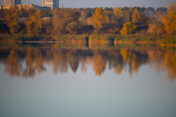 glare and reflections on the water. the sky is reflected in the water. Background of waves,...