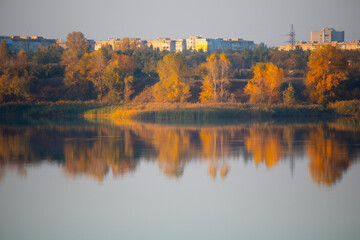 glare and reflections on the water. the sky is reflected in the water. Background of waves,...