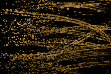 Abstract Gold Paint On Black Paper