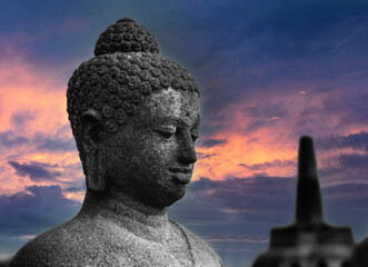 Sunset at Borobudur Yogyakarta Java Indonesia in the eighties. Budha statue.