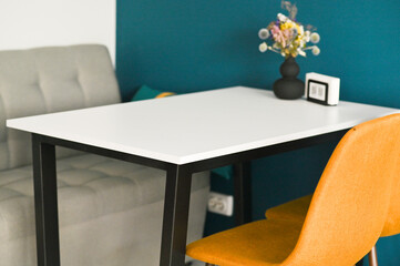 a white table in the interior of the cafe