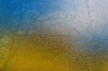 wet glass. textured background of water on glass