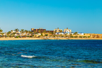 Fototapeta na wymiar Sunny resort beach on the shores of the Red Sea.
