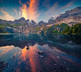 Fantastic summer sunrise on Oeschinen (Oeschinensee) lake, UNESCO World Heritage Site, Switzerland,...