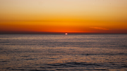 Sunset on the sea stock picture