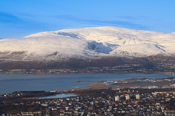 panoramic picture of the city Tromso from a viewpoint on top of a mountain