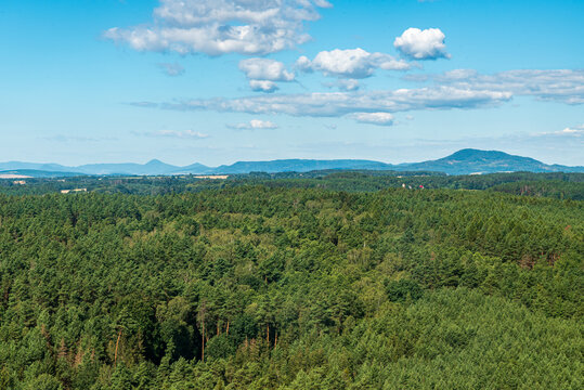 View to Ceske stredohoru mountains from Cap hill near Duba town in Czech republic