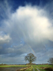 Clouds and rainbow at Ettelterweg Havelte Drenthe Netherlands.