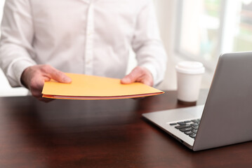 Businessman holding folder