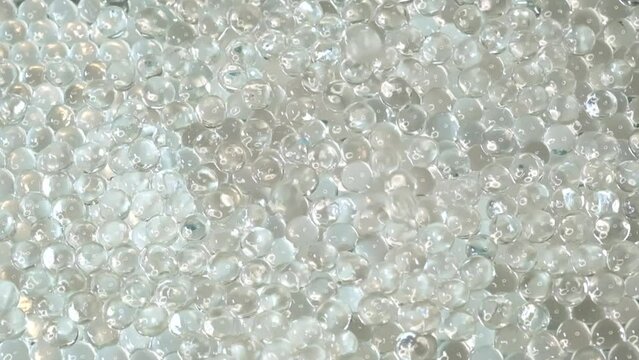 The delicate beauty of hydrogel beads up close, where each sphere acts like a tiny lens, magnifying the complexity of simple forms.