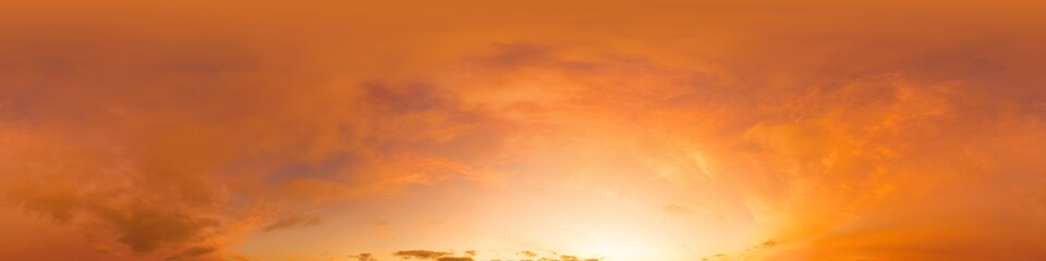 Bright sunset sky panorama with glowing red pink Cirrus clouds. HDR 360 seamless spherical panorama. Sky dome or zenith in 3D, sky replacement for aerial drone panoramas. Climate and weather change.