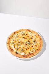 Italian Quattro Formaggi Pizza with Four Cheeses Isolated on White
