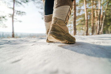 Womens foot steps in winter 