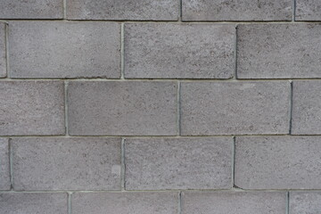 Close view of wall made of gray concrete masonry units