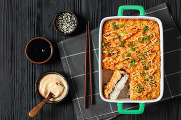 sushi bake with salmon, rice, seaweed, crab meat