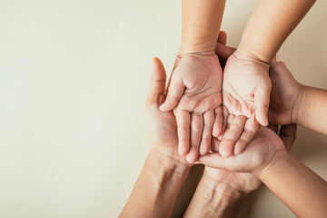 Parents and kid hold empty hands top view isolated. Commemorating Family Day expressing...