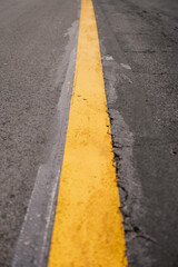 road texture with a yellow stripe in the center