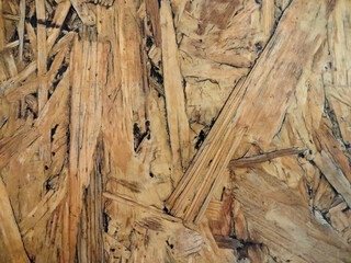 The table surface is made of wood chips
