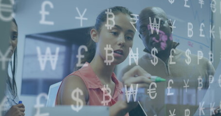 Image of financial data processing and currency symbols over diverse business people