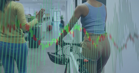 Image of financial data processing over diverse business women in office