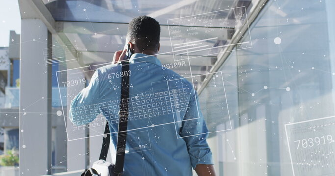 Image of financial data processing over biracial businessman in airport - Powered by Adobe