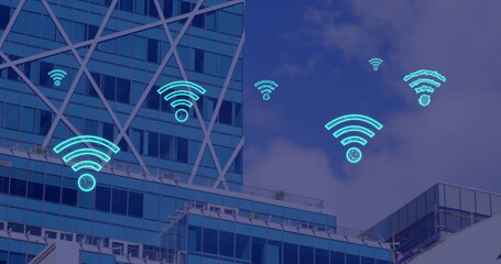 Image of digital wifi icons flying over cityscape